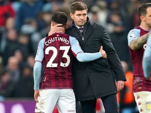               Aston Villa manager Steven Gerrard (right) hugs Philippe Coutinho 