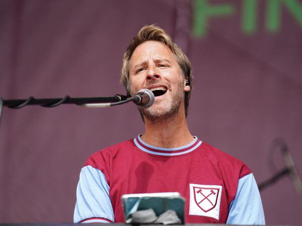 Chesney Hawkes performs on stage in the fan zone in Letenske Sady (James Manning/PA)ue Final â Fortuna Arena