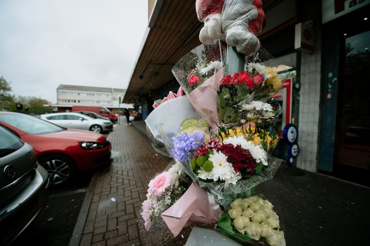Floral tributes left at West Cross Shopping Centre in Smethwick