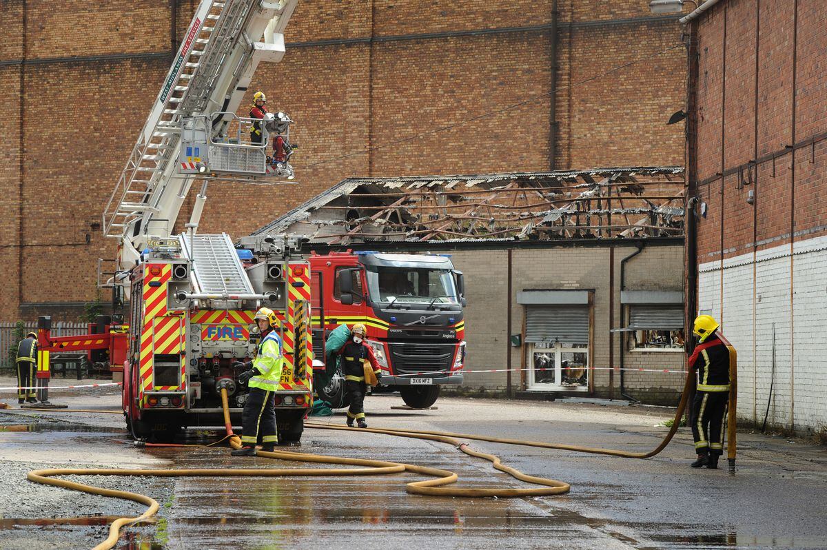 Crews of firefighters tackle the blaze off Showell Road