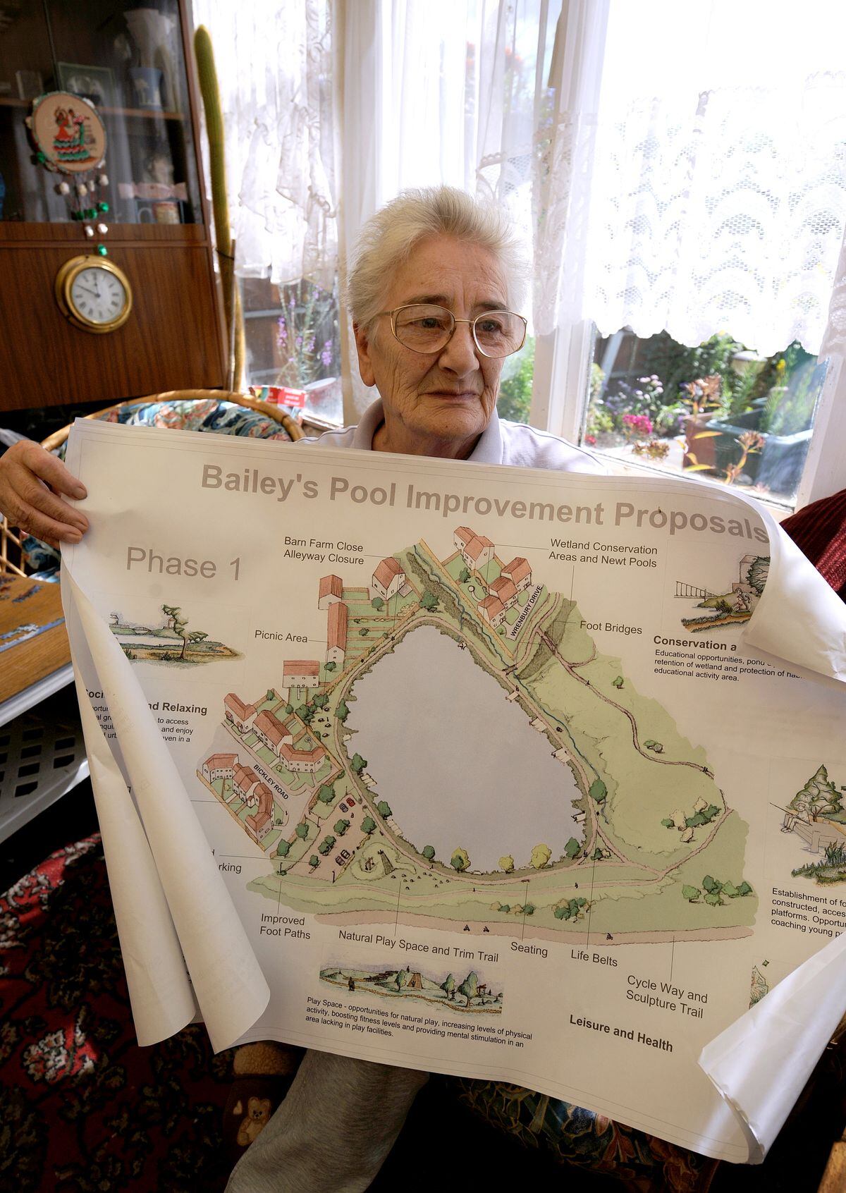 Ann Nightingale with an artists impression of Bailey's Pool, The Lunt, Bilston.