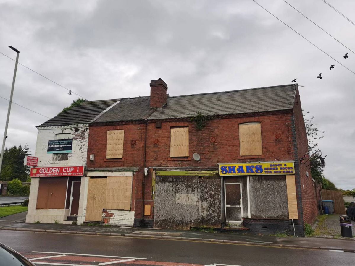 Front view of the four derelict shops