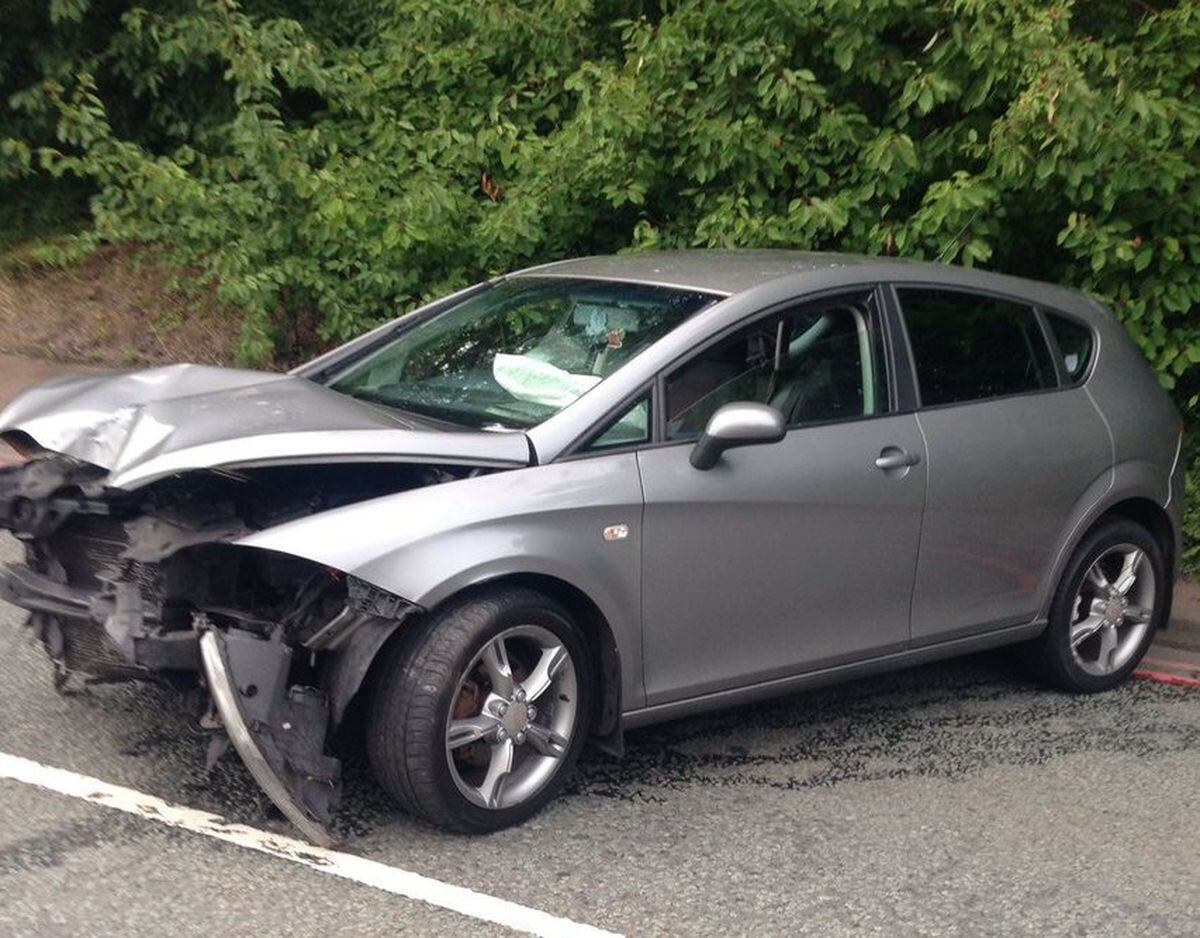 This car was involved in a crash with a street lamp. Photo: Oldbury Fire