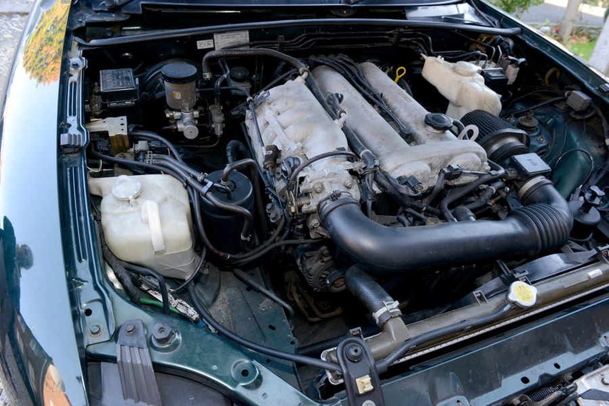 The engine bay where Lucky was found