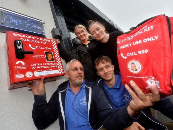 Cafe Roux in Willenhall, where a Bleed Kit in memory of Reagan Astbury has been installed. Pictured is cafe owner Deb Roberts and her daughter Jade Roberts, alongside fundraiser Anthony Barrett and his son George Barrett.