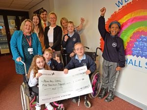 Penn Hall School came first in our Cash for Schools competition, winning £5,000. Pictured is headteacher Sarah Wilkinson with students and sponsors.