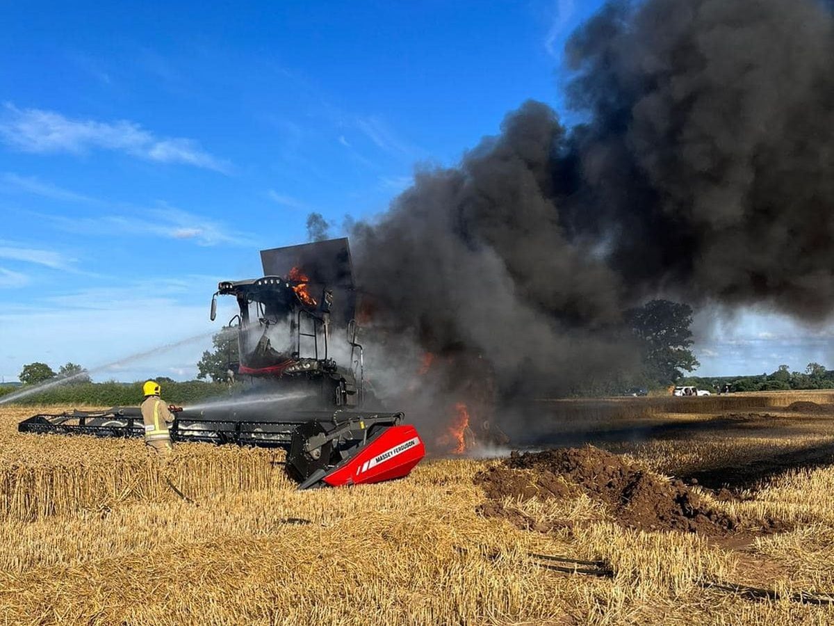 The destroyed combine harvester after the fire had been put out. Photo: Rising Brook Community Fire Station