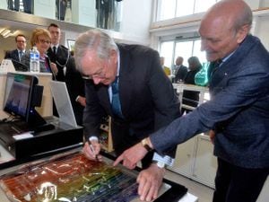 The Duke of Gloucester signing a plaque at Stourbridge Glass Museum with Graham Knowles 