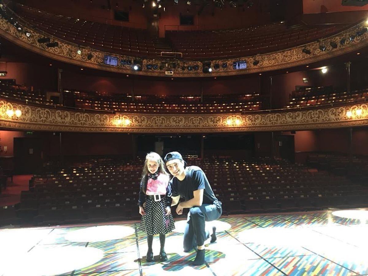 Rosie on stage with Tom when he was performing as Danny in Grease