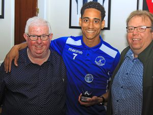 Chasetown supporters’ player of the year Chris Baker with fans John Franklin and Andy Cox Picture: David Birt