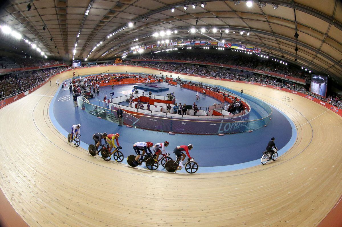 Great Britain's Chris Hoy (third right) rides in the Men's Keirin First Round in the Velodrome at the Olympic Park