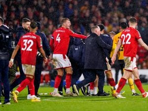 Nottingham Forest manager Steve Cooper attempts to intervene as tempers flare between players following a penalty shoot-out. The Football Association is reviewing the mass brawl between Nottingham Forest and Wolves at the end of their Carabao Cup quarter-final, the PA news agency understands. Issue date: Thursday January 12, 2023.