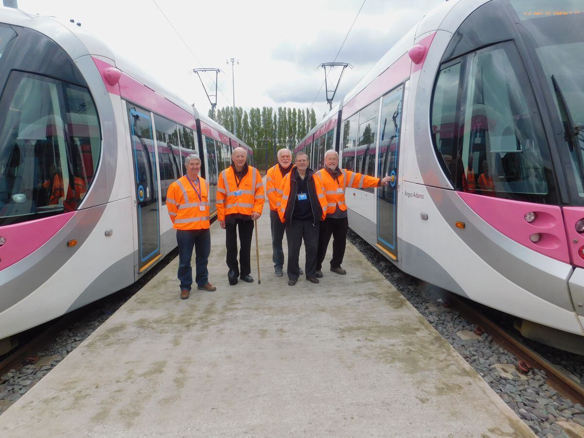 Paul Handley, John Tetler, Mike Smith, David Probert and William Darby enjoy a tour of the Midland Metro depot in Wednesbury.