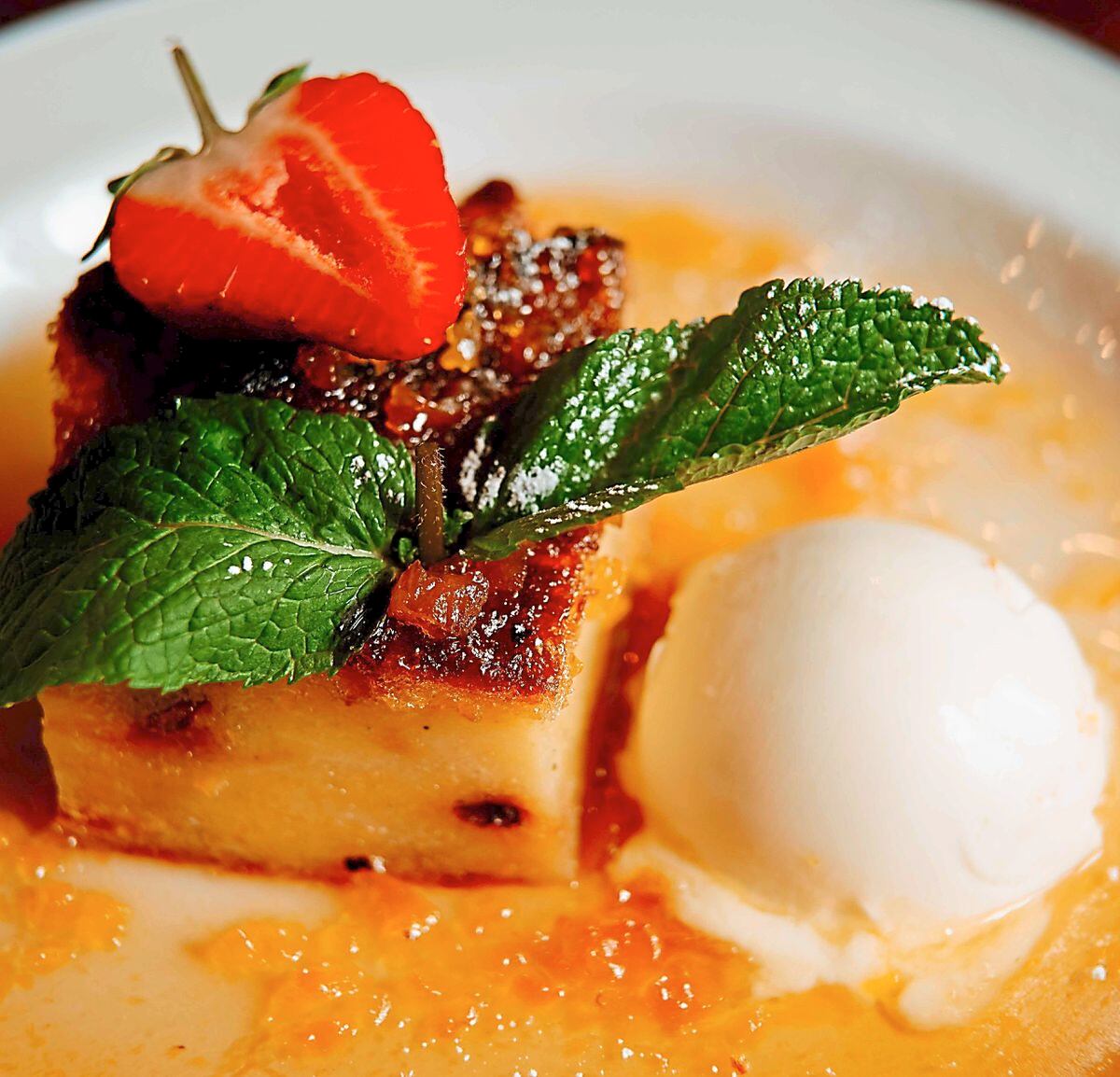The bread and butter pudding with apricot sauce