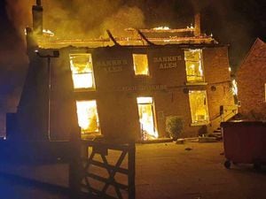 The Crooked House burning on Saturday night. Photo: Chris Green