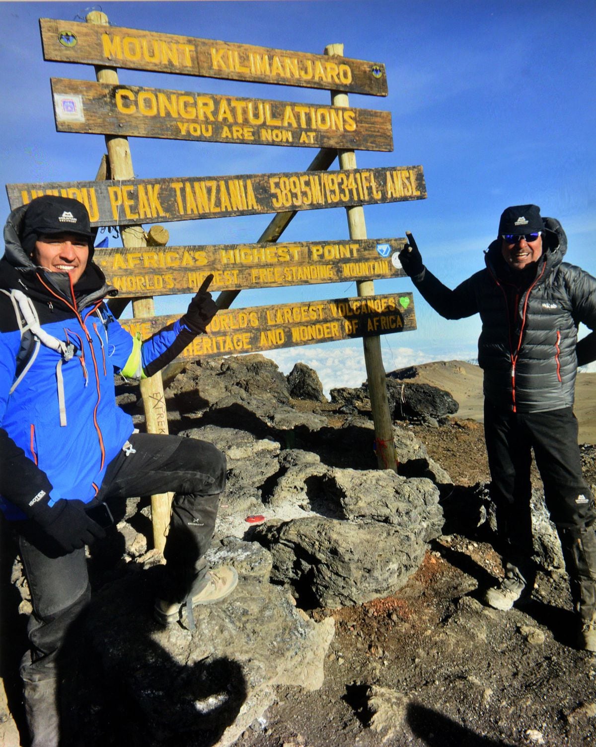 Suresh Bawa at the top of Kilimanjaro with son Arran