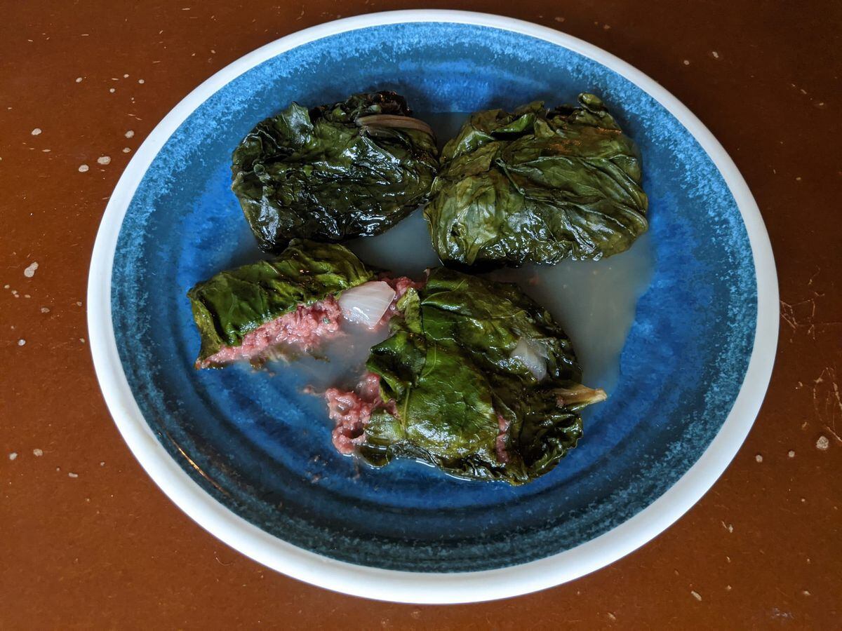 Kiribatians love this dish of corned beef or mutton, onion, garlic, salt, pepper, and coconut cream, wrapped in big taro leaves