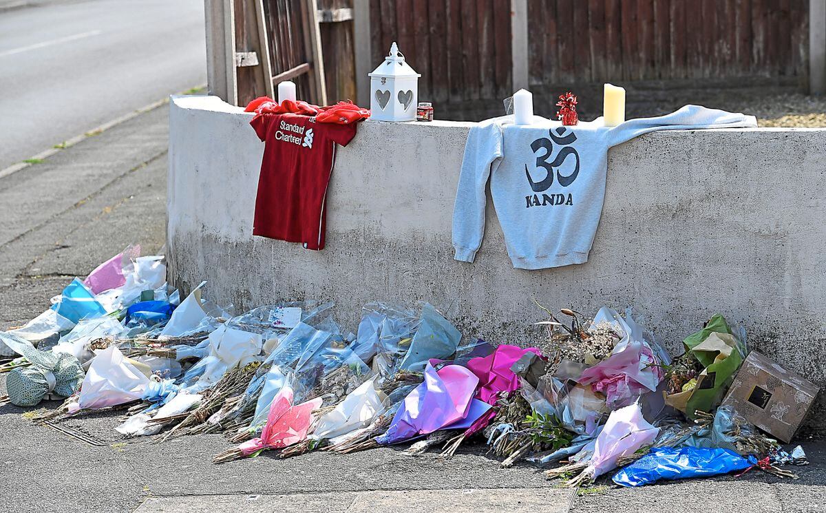 Tributes in Mount Road, Lanesfield, where Ronan Kanda was attacked