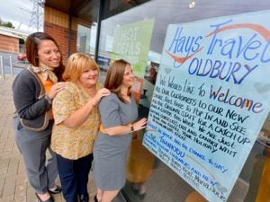Former Oldbury Thomas Cook staff Emma Bagley, Karen James and Hayley Gulliver celebrate the Hays Travel takeover