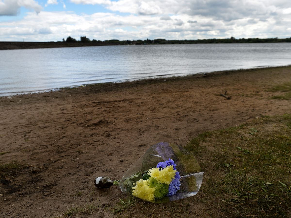 Flowers at Chasewater in tribute to a 21-year-old man who died there on Sunday