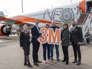 Lucky easyJet travellers Terri and William Powell, centre, from Rowley Regis