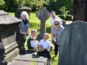 Taking part in a churchyard study, Pelsall Village School pupils (left) Kian Hickman, 7, and (right) Harrison Weston, 7, with reverend Alison Morris, councillor Edward Lee and councillor Rose Martin, at St Michael and All Angels, Pelsall