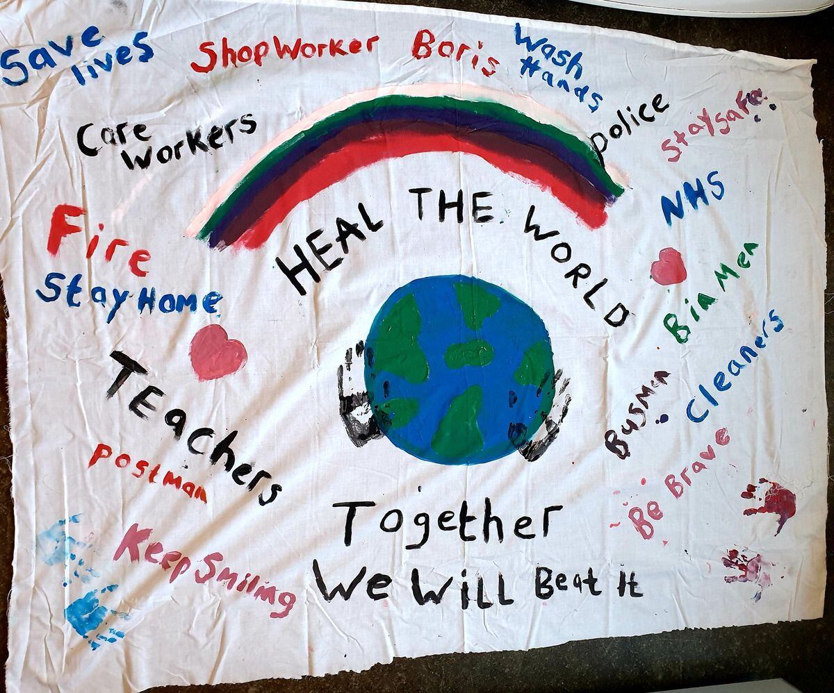 Sammy Wellington, from Walsall, made this banner with her sons, Rhys and Riley Foster to hang from their balcony to share with all their community. Sammy said: "We can beat this virus and we can heal the world by sticking together!"