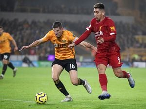 
              
Wolverhampton Wanderers's Conor Coady (left) and Liverpool's Roberto Firmino battle for the ball during the Premier League match at Molineux, Wolverhampton. PA Photo. Picture date: Thursday January 23, 2020. See PA story SOCCER Wolves. Photo credit should read: Nick Potts/PA Wire. RESTRICTIONS: EDITORIAL USE ONLY No use with unauthorised audio, video, data, fixture lists, club/league logos or "live" services. Online in-match use limited to 120 images, no video emulation. No use in betting, games or single club/league/player publications.
            
