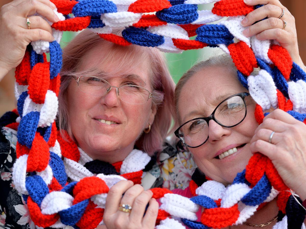 Donna Martin, left, and Jill Turner along with a team of volunteers are knitting red, blue and white bunting for the event 