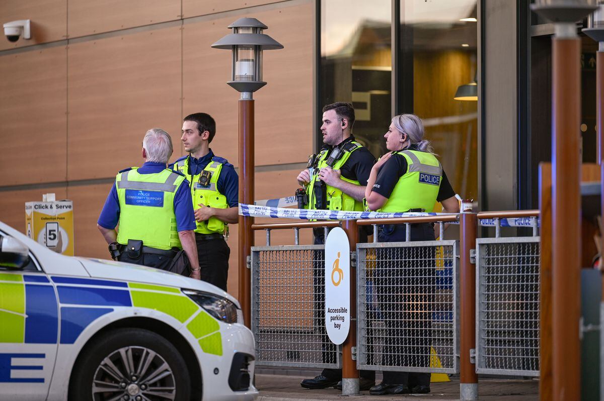 Police at the scene of the incident at McDonald's.  Photo: SnapperSK