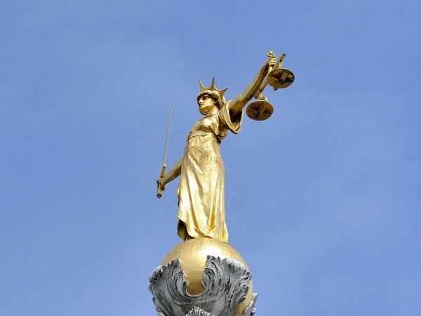 The statue of Lady Justice on the dome of the Old Bailey