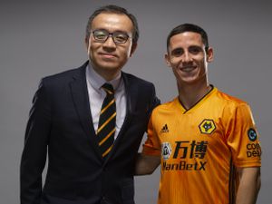 Podence with chairman Jeff Shi (Credit: Wolves)