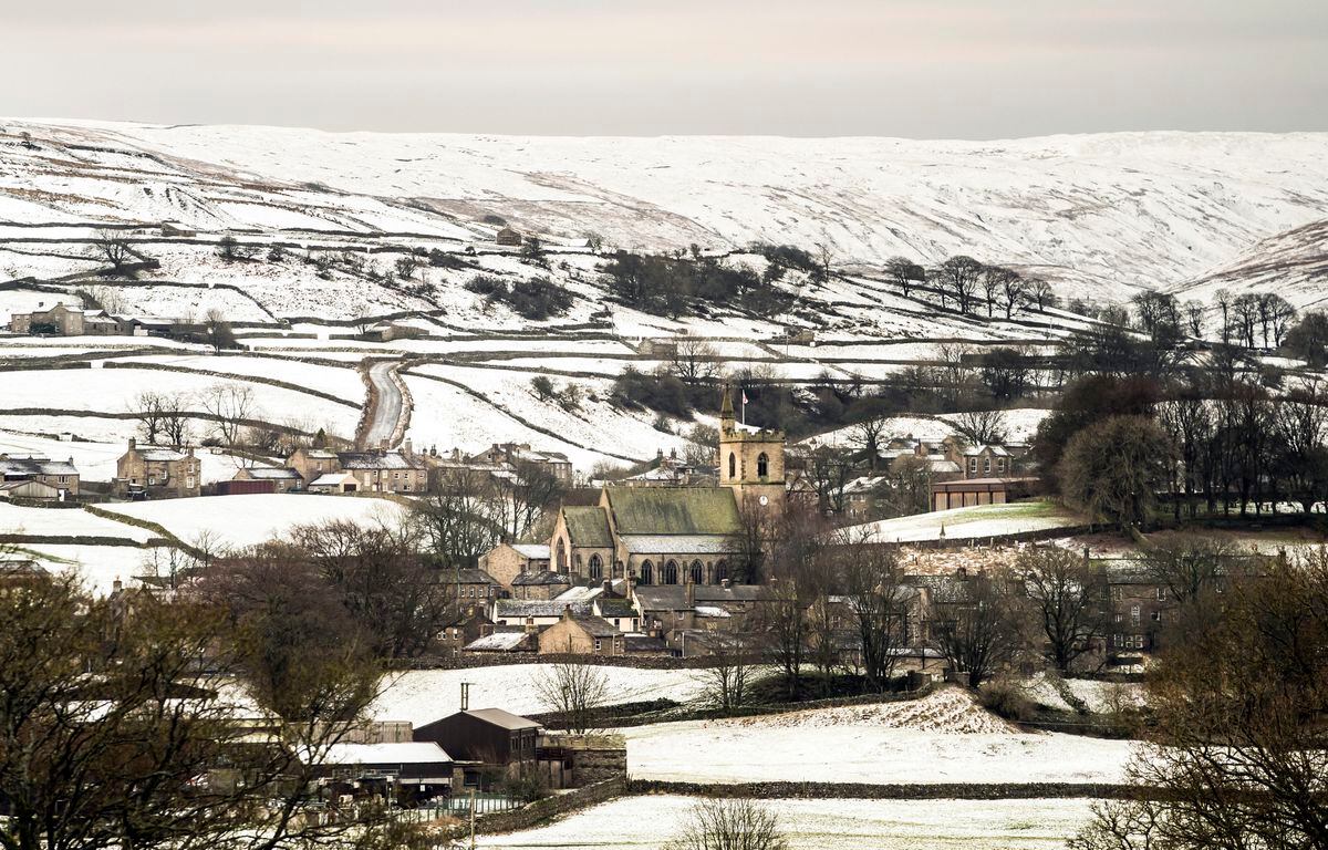 The Grade II listed St Margaret's Church in Hawes, North Yorkshire, sits surrounded by snow covered fields. Photo: Danny Lawson/PA Wire            