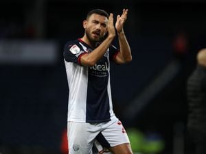 WEST BROMWICH, ENGLAND - OCTOBER 23: Robert Snodgrass of West Bromwich Albion applauds the West Bromwich Albion Fans after the Sky Bet Championship match between West Bromwich Albion and Bristol City at The Hawthorns on October 23, 2021 in West Bromwich, England. (Photo by Adam Fradgley/West Bromwich Albion FC via Getty Images).
