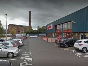Armed police have cordoned offthe Park Butts Ringway retail park. Image: Google.