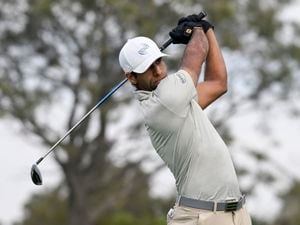 Aaron Rai holds hits his tee shot on the second hole of the South Course during the third round of the Farmers Insurance Open golf tournament, Friday Jan. 28, 2022, in San Diego. (AP Photo/Denis Poroy).