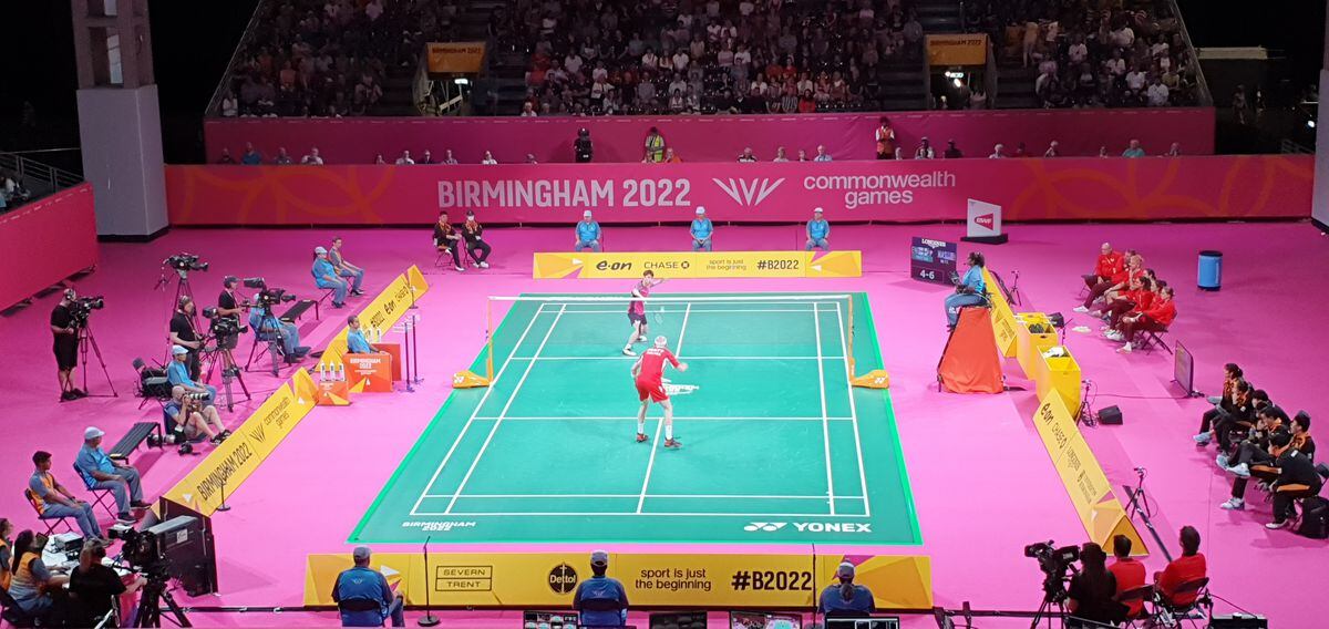 The badminton court is colourful and provides fast action from the players