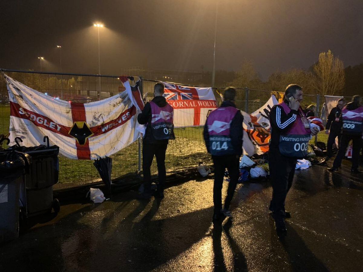 Wolves stewards tried to retrieve flags which were confiscated outside the ground