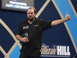 Cradley Health's Jason Lowe on his way to victory in the PDC World Darts Championship First Round - Credit Lawrence Lustig/PDC