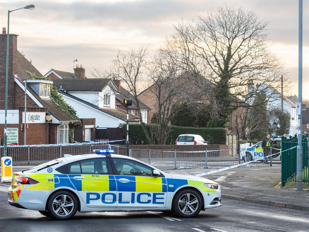 Police cordon near the scene  Photo: Shaun Fellows/ Shine Pix Ltd