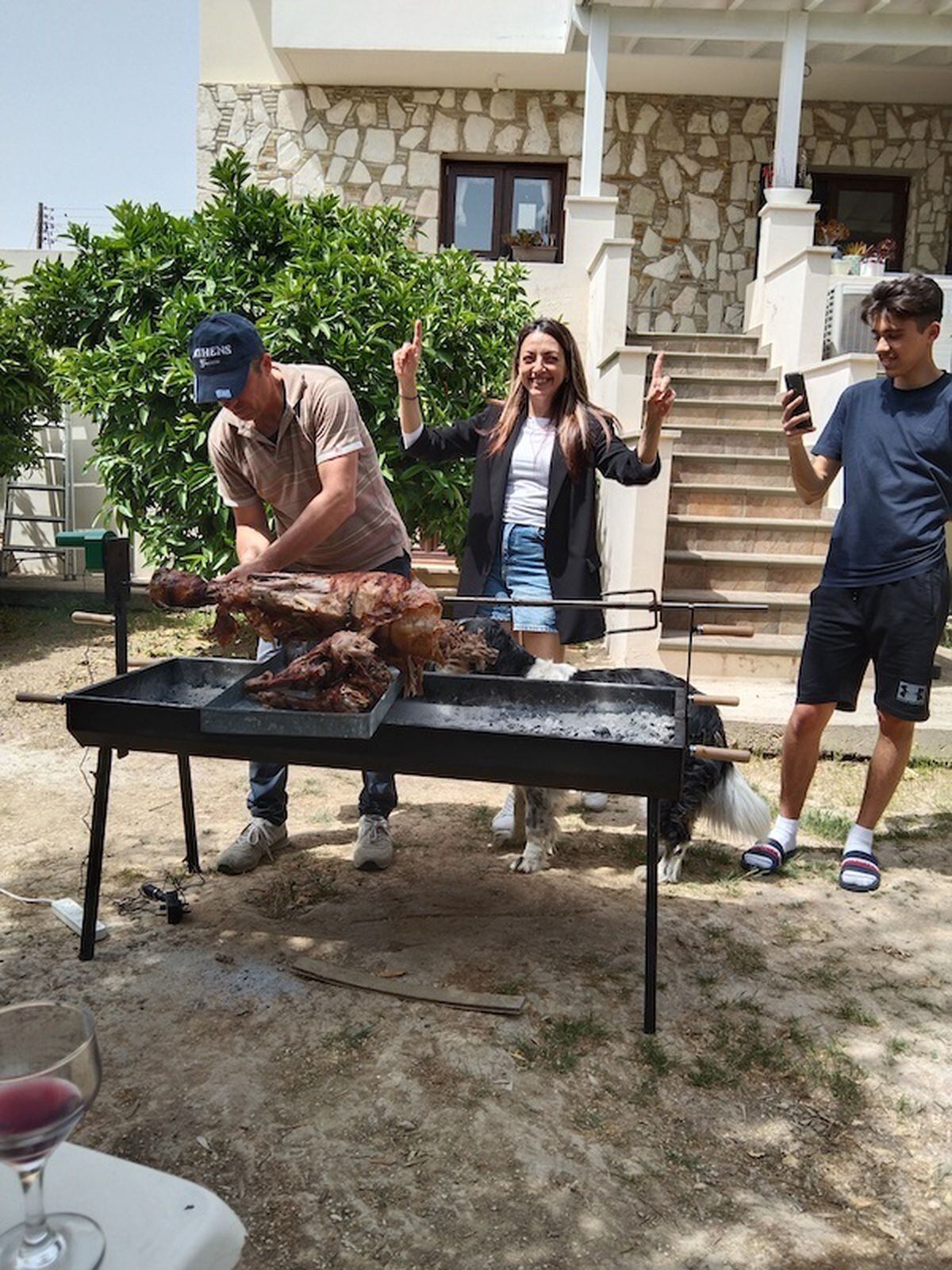Lamb roasting on a spit at a typical Cypriot Easter barbecue