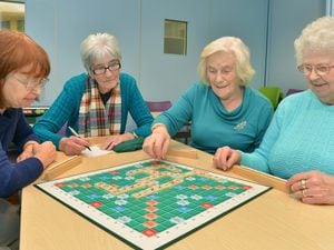 L-R: Barbara Betts, Carole Green and Sheila Brueton and Beryl Smith enjoy a game of scrabble at Blackheath Library High St, Rowley Regis