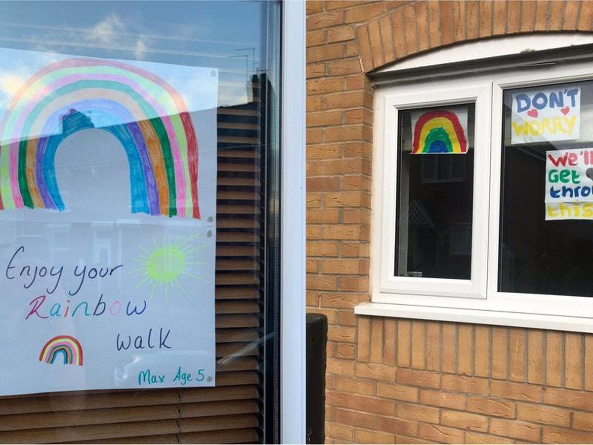 Pictures of rainbows in windows to cheer passers-by