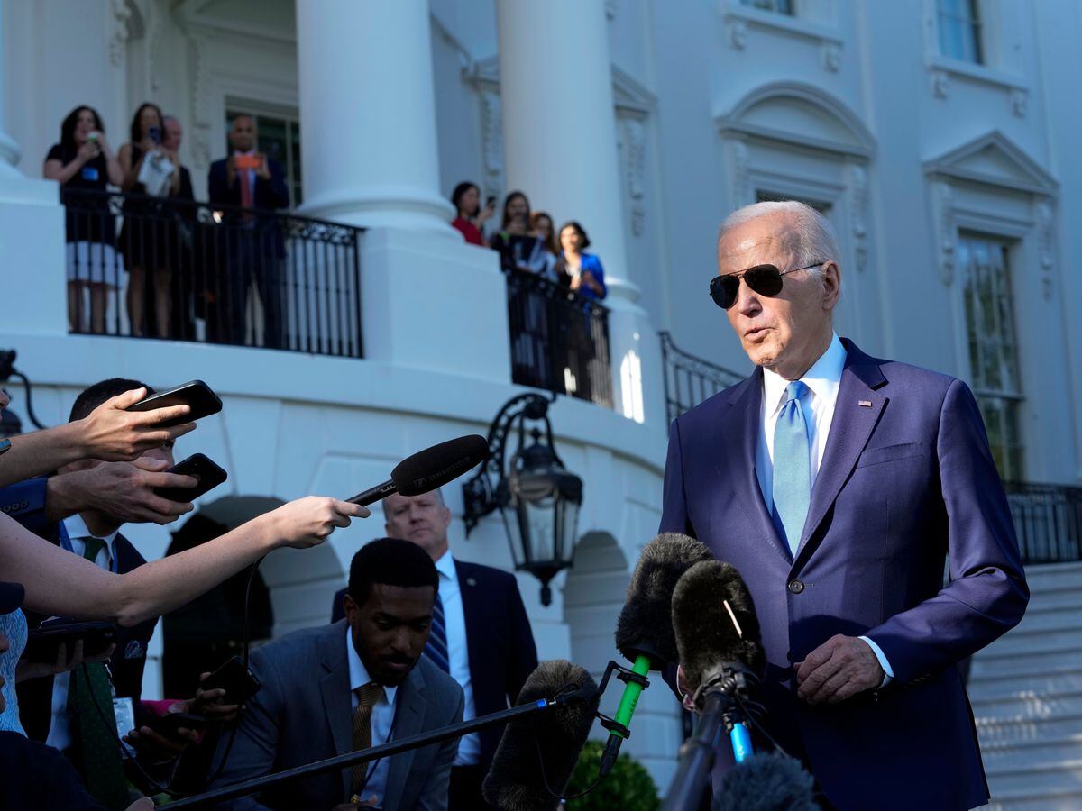 President Joe Biden speaks to reporters