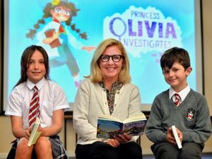 Sophia McHugh and Sam Timms were among pupils getting the chance to meet author Lucy Hawking