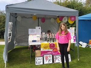 Amy Hayes with her stall and gazebo.
