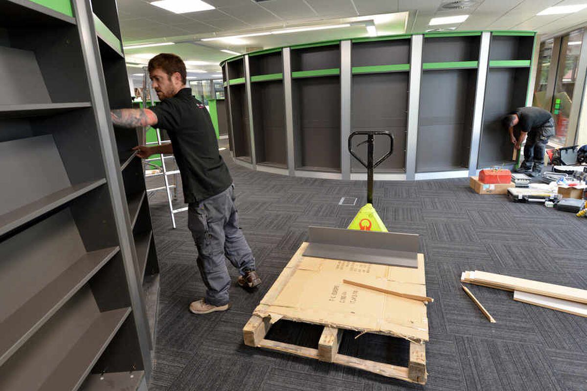 Shelving goes up in the main library area