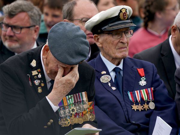 Normandy Veteran Terry Burton (left) during the Royal British Legion Service of Remembrance to commemorate the 79th anniversary of the D-Day landings at the Bayeux Cemetery in Normandy