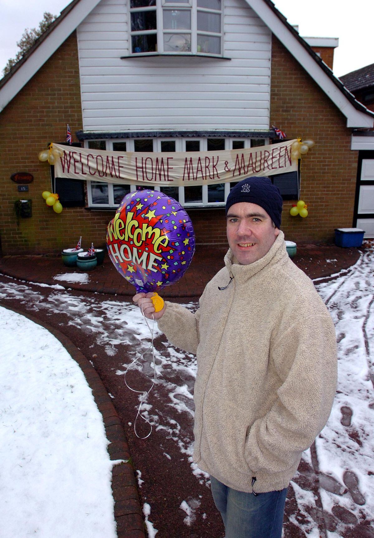 Mark Allen arrived home to a house decorated by his neighbours in Cannock Wood after his double lung transplant.