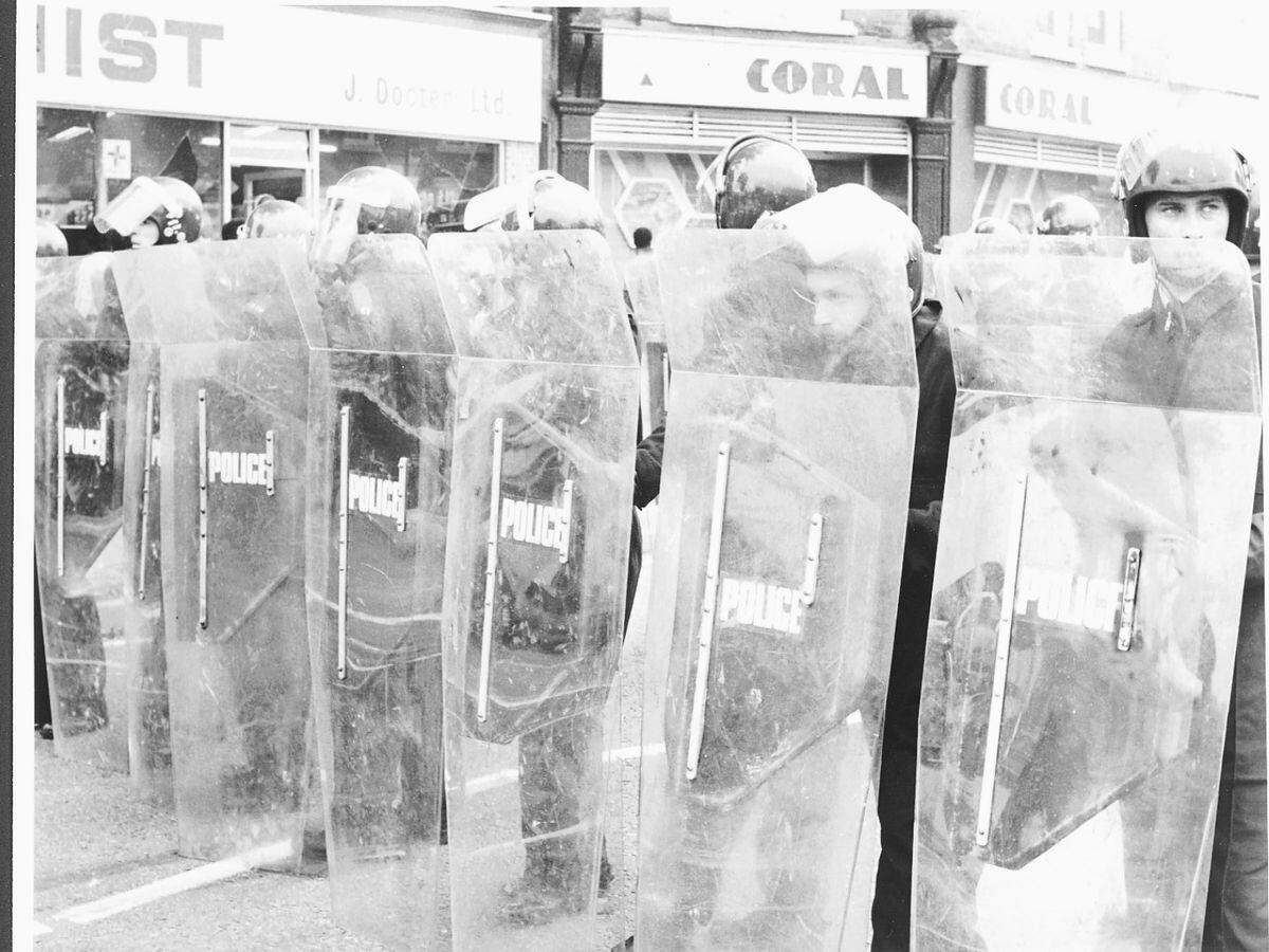 Police facing rioters in Handsworth in July, 1981